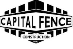 A solid black logo of Capital Fence in the middle of a fence.